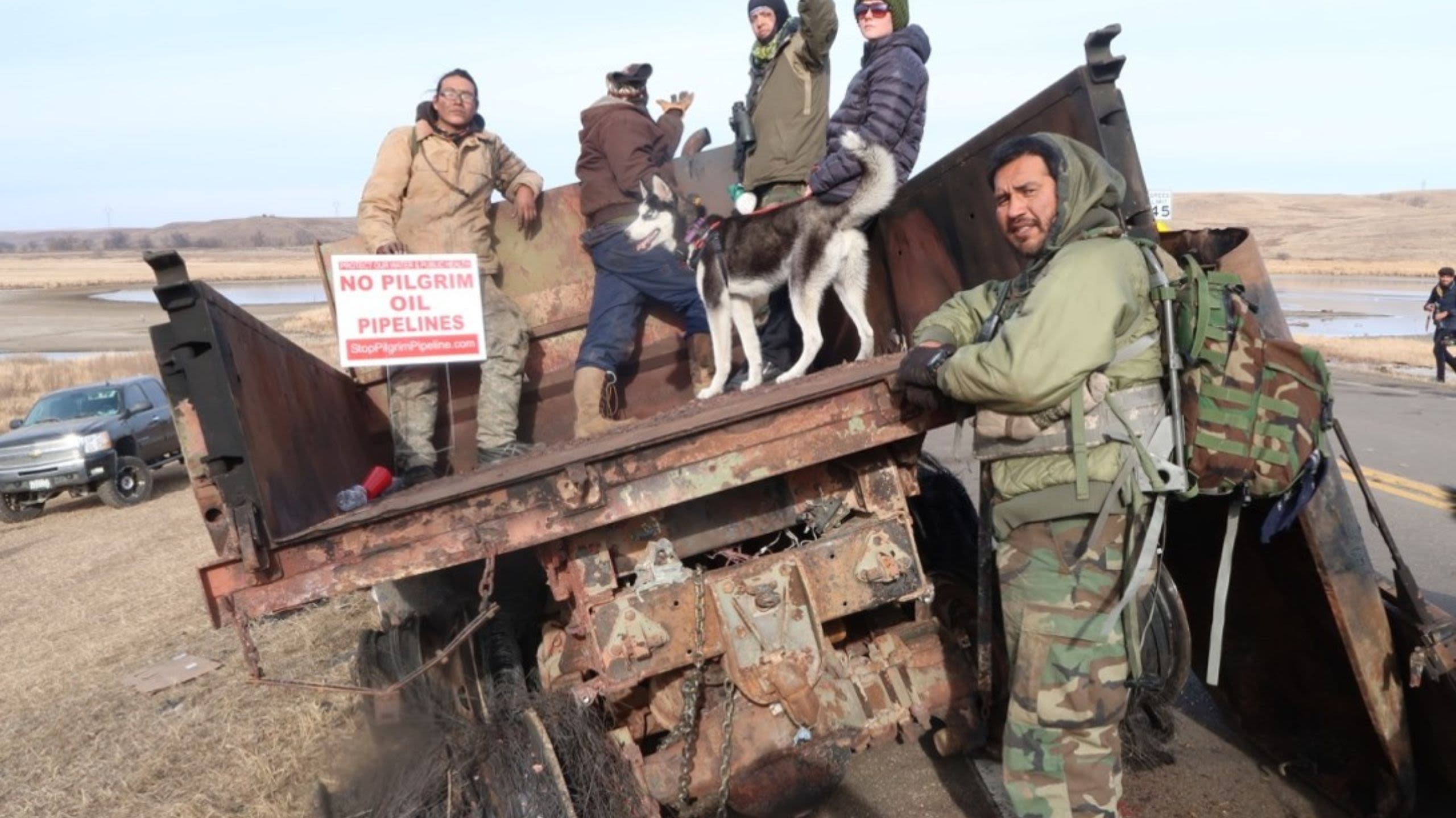 Protesters at Standing Rock on back of truck